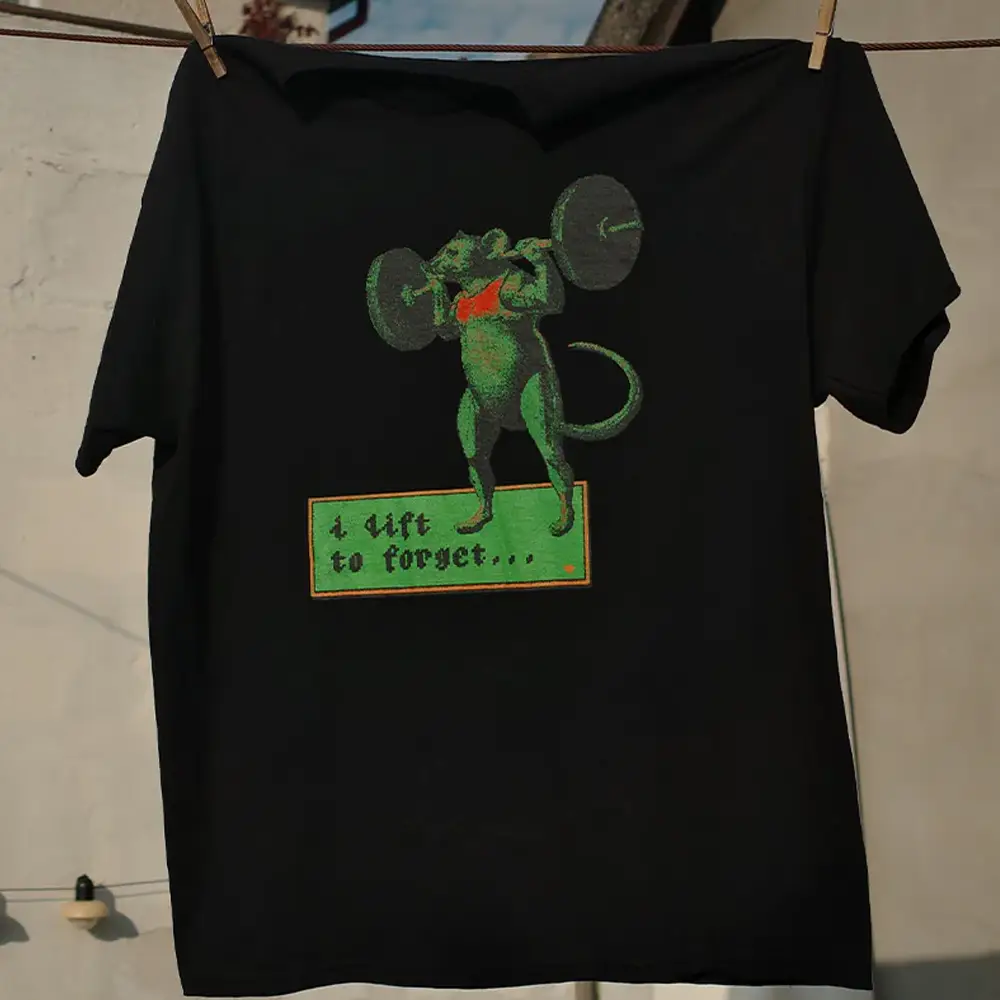 Funny black t-shirt with the text "I lift to forget..."